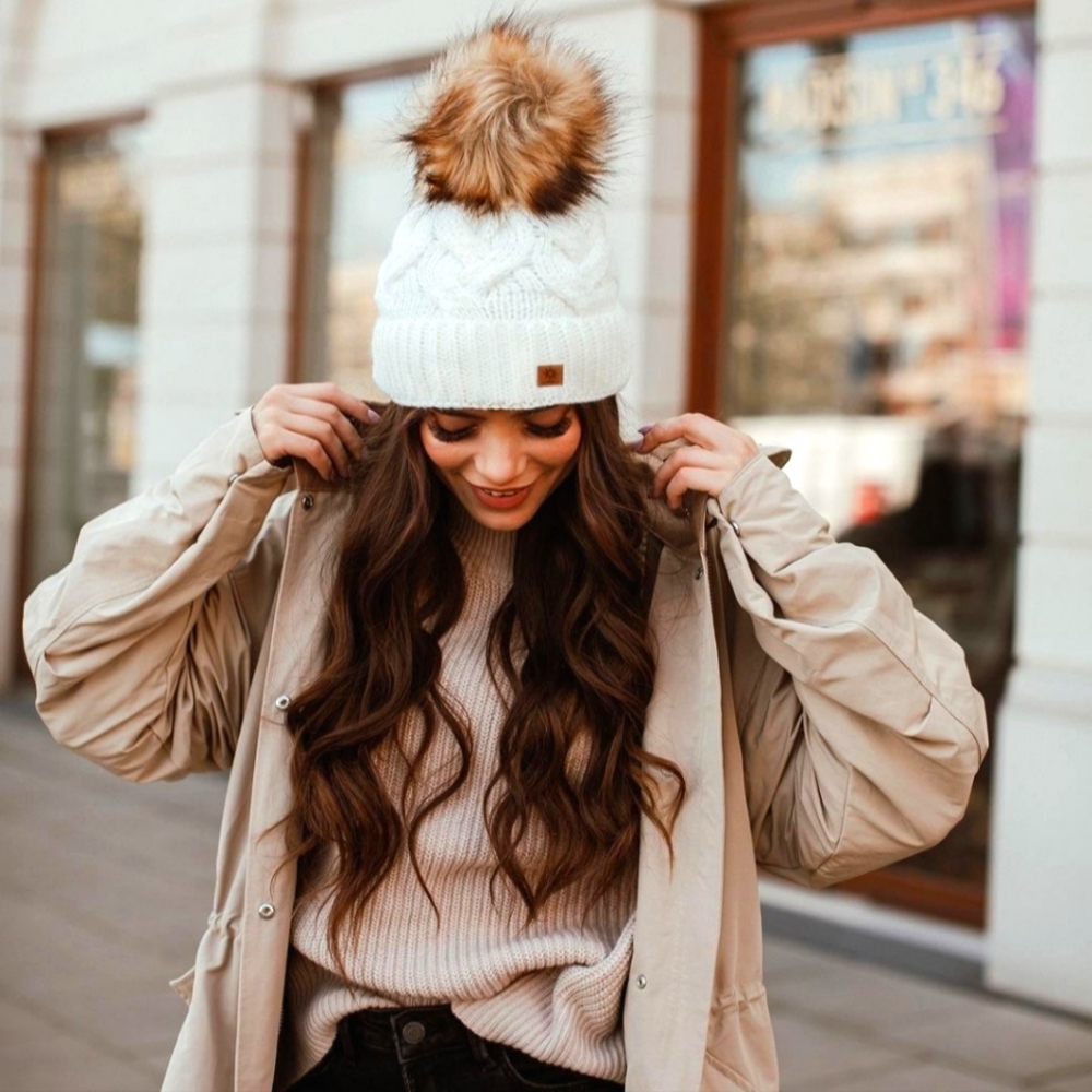 NWT ecru hat with pom on top. Beautiful brand out of Poland.